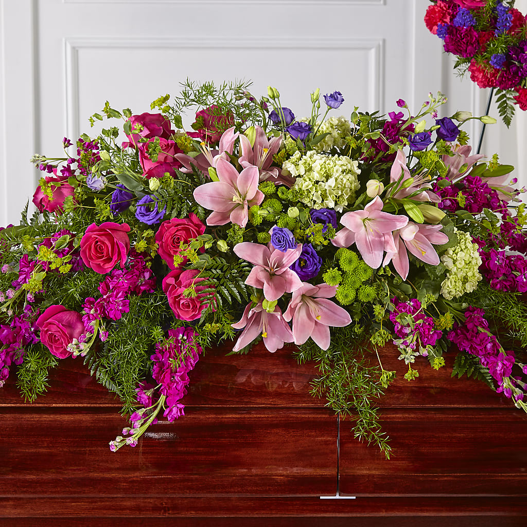 Radiant Tribute Casket Spray – The Florist Ltd, Denton TX