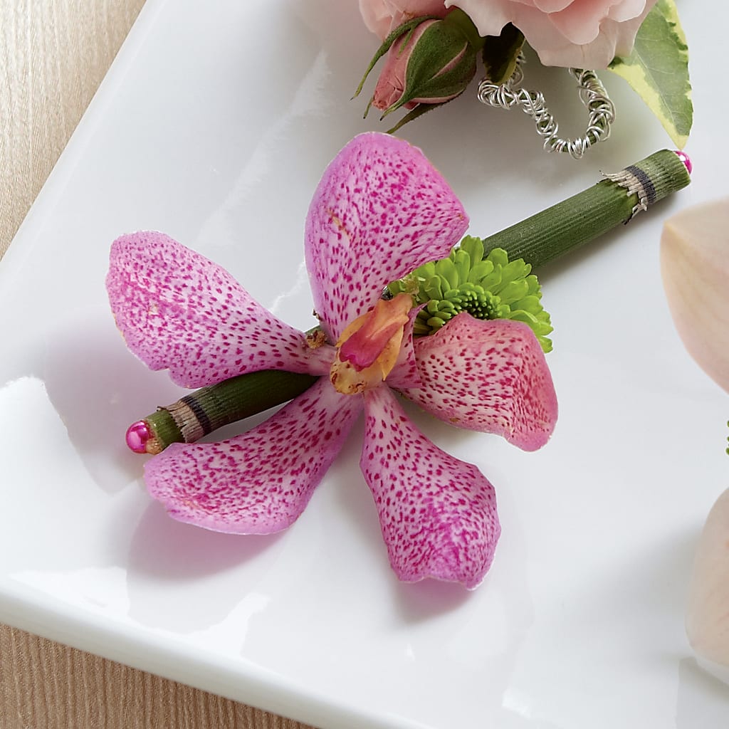 Pink Mokara Boutonniere – The Florist Ltd, Denton TX